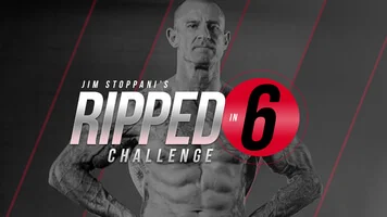 A muscular man with tattoos stands confidently with hands on his hips, wearing workout attire. The text "Dr. Stoppani's Ripped in 6 Challenge" is prominently displayed to the left of him. The background is dark with red diagonal lines, emphasizing the power of personalized training programs.